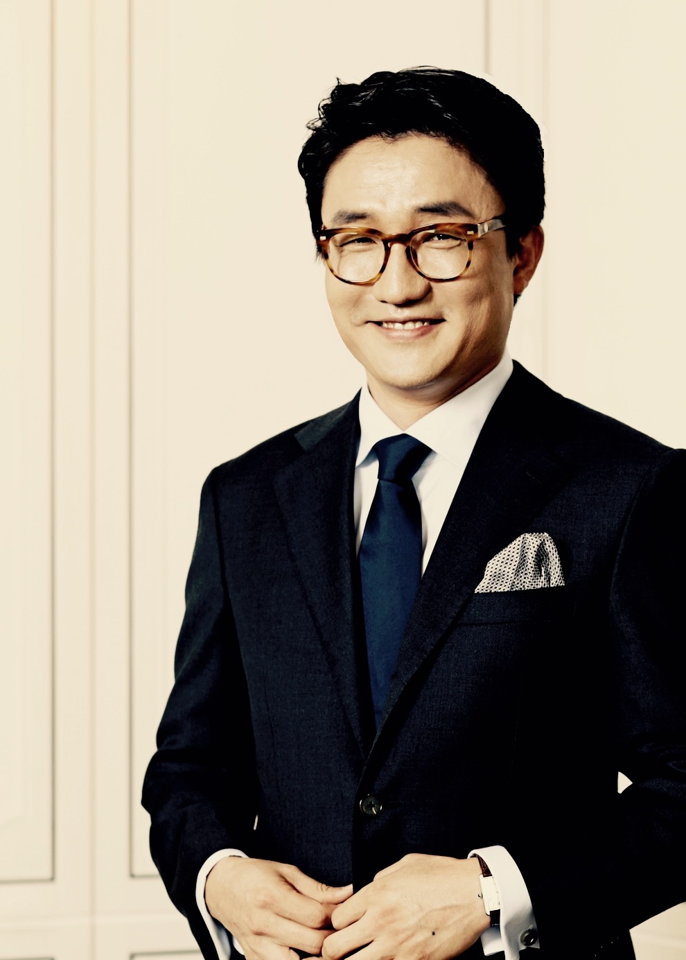 Portrait of Santé Ahn in a dark suit